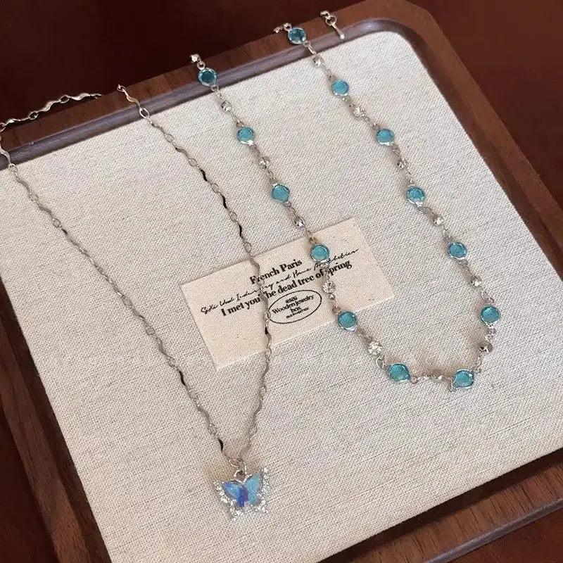 Blue Crystal Butterfly Layered Necklace – Elegant Double Chain Britt Company